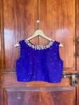 Red sleeveless hand embroidery blouse