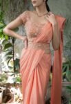 Peach silk saree with hand embroidered blouse