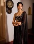 Black chinnon silk saree with hand embroidered blouse