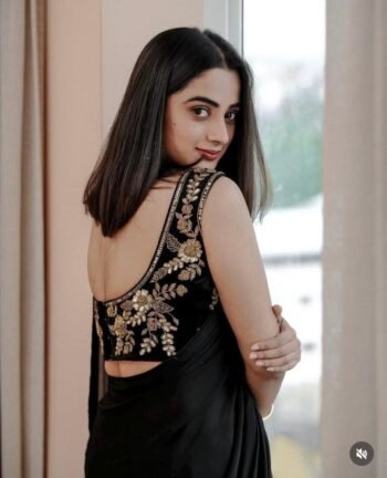 Black crepe silk saree with hand embroidered blouse