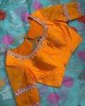 Orange hand embroidery blouse